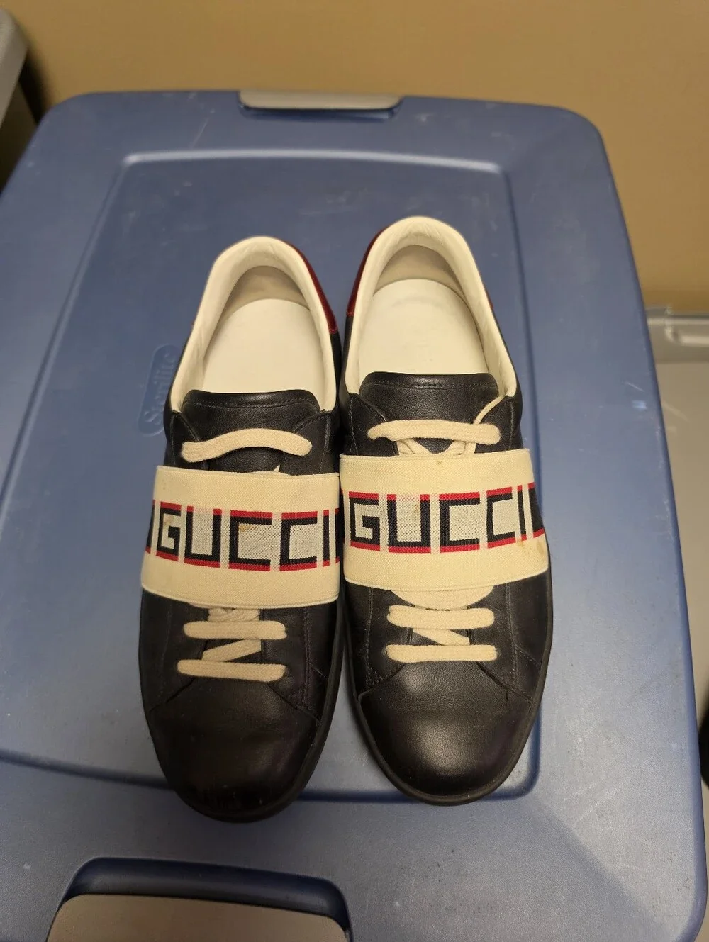 Gucci Men’s Black Leather New Ace Sneakers with Red Heel and Beige Branded Strap